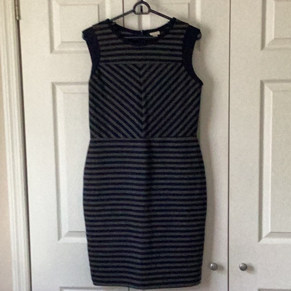 Body-hugging striped sleeveless dress. Like new.